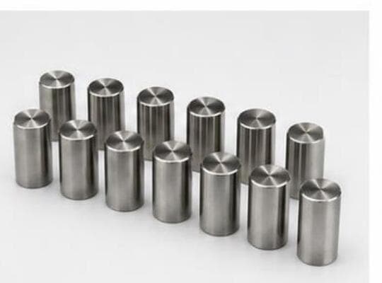 Machined titanium pins for orthopedic fixation hardware.