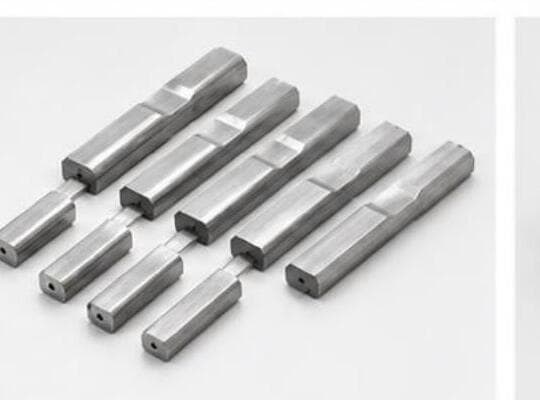 Stepped drive shafts for powered surgical tools.